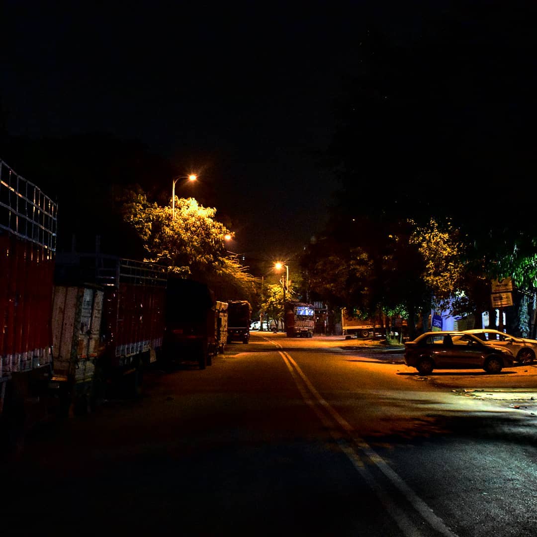 Aesthetic Blasphemy | Empty road with parked cars and street lights